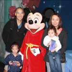 Family with Mickey on set